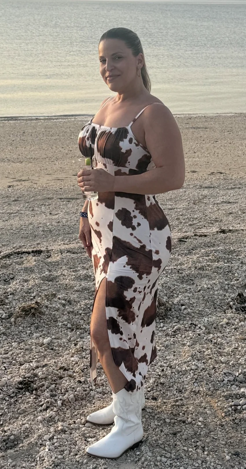 Allison Caggia standing beside the water