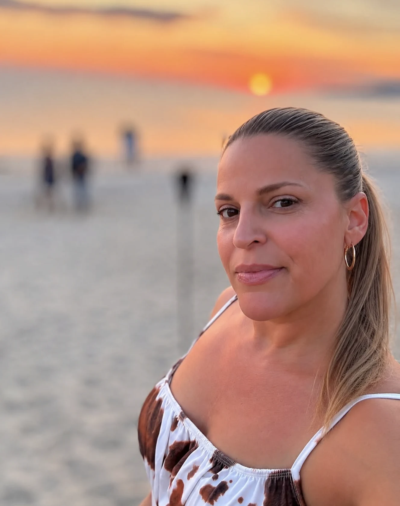 Portrait of Allison Caggia at the beach during sunset